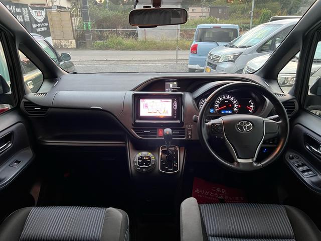 ヴォクシー ZS 煌 地上デジタル 両側パワードア アイドリングストップ車 パワーウィンド 横滑防止 ブルートゥースオーディオ Aライト 衝突安全ボディ 整備記録簿 DVD可 フルフラットシート 電格ミラー 盗難防止装置(40枚目)