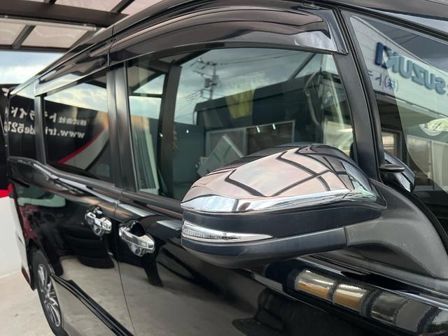 ヴォクシー ZS 煌 地上デジタル 両側パワードア アイドリングストップ車 パワーウィンド 横滑防止 ブルートゥースオーディオ Aライト 衝突安全ボディ 整備記録簿 DVD可 フルフラットシート 電格ミラー 盗難防止装置(56枚目)