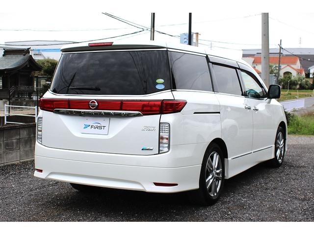 エルグランド ２５０ハイウェイスター　後席モニター　Ｂｌｕｅｔｏｏｔｈ　両側パワースライドドア　ＥＴＣ　セキュリティ　バックカメラ　オットマン　マルチファンクションコンソール　デイライト　ウォークスルー　サンシェード　ＴＶ（2枚目）