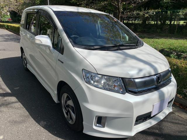 フリードスパイクハイブリッド ジャストセレクション　ワンオーナー車／純正ナビ・フルセグＴＶ／両側パワースライド／バックカメラ／純正アルミホイール／ステアリングスイッチ／オートライト／ＥＴＣ／Ｂｌｕｅｔｏｏｔｈ接続（5枚目）