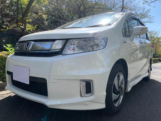 フリードスパイクハイブリッド ジャストセレクション　ワンオーナー車／純正ナビ・フルセグＴＶ／両側パワースライド／バックカメラ／純正アルミホイール／ステアリングスイッチ／オートライト／ＥＴＣ／Ｂｌｕｅｔｏｏｔｈ接続（7枚目）