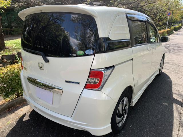 フリードスパイクハイブリッド ジャストセレクション　ワンオーナー車／純正ナビ・フルセグＴＶ／両側パワースライド／バックカメラ／純正アルミホイール／ステアリングスイッチ／オートライト／ＥＴＣ／Ｂｌｕｅｔｏｏｔｈ接続（10枚目）