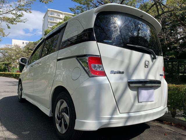 フリードスパイクハイブリッド ジャストセレクション　ワンオーナー車／純正ナビ・フルセグＴＶ／両側パワースライド／バックカメラ／純正アルミホイール／ステアリングスイッチ／オートライト／ＥＴＣ／Ｂｌｕｅｔｏｏｔｈ接続（11枚目）