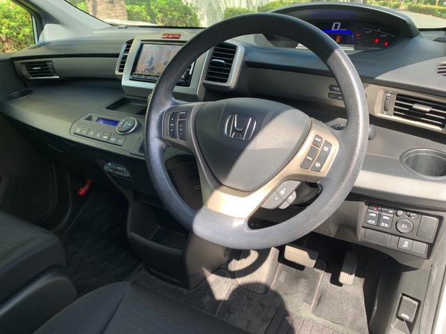 フリードスパイクハイブリッド ジャストセレクション　ワンオーナー車／純正ナビ・フルセグＴＶ／両側パワースライド／バックカメラ／純正アルミホイール／ステアリングスイッチ／オートライト／ＥＴＣ／Ｂｌｕｅｔｏｏｔｈ接続（24枚目）