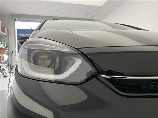 フィット ｅ：ＨＥＶホーム　ホンダセンシング　クルーズコントロール（追従あり）　レーンキープアシスト　衝突被害軽減システム　クリアランスソナー　ＬＥＤヘッドライト　オートマチックハイビーム　オートライト　電動パーキングブレーキ（39枚目）