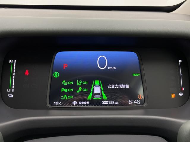 フリード ｅ：ＨＥＶクロスター　両側パワースライドドア／衝突被害軽減ブレーキ／ブラインドスポットモニター／レーダークルーズコントロール／横滑り防止装置／レーンキープアシスト／前後コーナーセンサー／前席シートヒーター（9枚目）