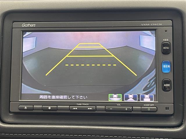 ヴェゼル ハイブリッドＺ・ホンダセンシング　純正ナビ　追従クルコン　ＨＤＭＩ　禁煙　ＴＶ　ＣＤ再生　ホンダセンシング　バックカメラ　黒ハーフレザー　衝突軽減　ＥＴＣ　パドルシフト　シートヒーター　車線逸脱　ＬＥＤライト　フォグ　純正フロアマット（6枚目）