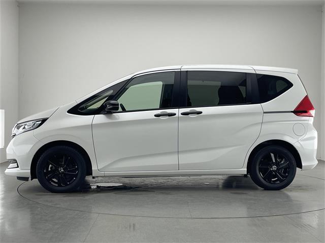 フリードハイブリッド ハイブリッド・Ｇブラックスタイル　純正９型ナビ　両側パワスラ　追従クルコン　禁煙車　フルセグＴＶ　ＤＶＤ　ホンダセンシング　ＥＴＣ　バックカメラ　シートヒーター　衝突軽減　コーナーセンサー　ＬＥＤライト　純正マット　ロールサンシェード（19枚目）