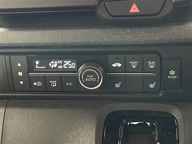 N-BOXカスタム コーディネートスタイル ホンダセンシング 衝突軽減 禁煙 追従クルコン ハンドル支援 ナビ装着用パッケージ ハーフレザー シートヒーター 両側パワースライドドア 電動パーキングブレーキ リアロールシェード シート背面テーブル(4枚目)