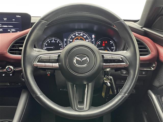 MAZDA3ファストバック 20Sバーガンディ セレクション 純正8.8型ナビ BOSE 赤革 禁煙 HUD BSM HDMI パドルシフト 追従クルコン フルセグ DVD パワーシート シートヒーター ETC ドラレコ LEDライト 衝突軽減 コーナーセンサー(10枚目)