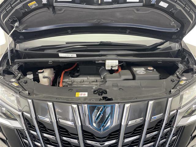 アルファードハイブリッド エグゼクティブラウンジＳ　メーカーナビ　全方位カメラ　ＪＢＬ　禁煙　Ｗムーンルーフ　リヤエンターテイメント　デジインミラー　パーキングアシスト　黒革　ワイヤレス充電　ＨＤＭＩ　ＢＳＭ　ベンチレーション　ＡＣ１００Ｖ　ＤＶＤ再生（24枚目）