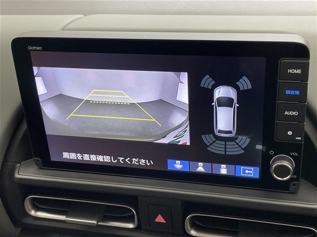 フリード ｅ：ＨＥＶクロスター　登録済未使用車　純正９型ナビ　禁煙　シートヒーター　ハーフレザー　電動パーキング　ホンダセンシング　衝突軽減　追従クルコン　ハンドル支援　コーナーセンサー　ＬＥＤオートライト　両側パワースライドドア（4枚目）