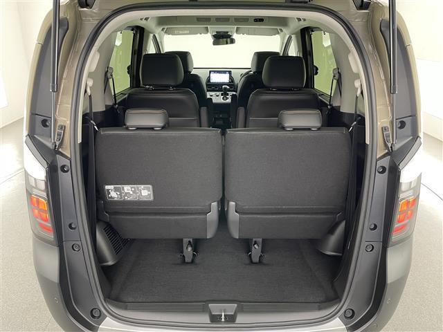 フリード ｅ：ＨＥＶクロスター　登録済未使用車　純正９型ナビ　禁煙　シートヒーター　ハーフレザー　電動パーキング　ホンダセンシング　衝突軽減　追従クルコン　ハンドル支援　コーナーセンサー　ＬＥＤオートライト　両側パワースライドドア（23枚目）