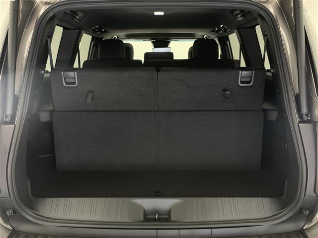 ランドクルーザー250 VX 純正12.3型ナビ JBLサウンド ムーンルーフ 丸目LEDヘッドライト 全方位カメラ ワイヤレス充電 デジタルインナーミラー BSM ルーフレール 電動リアゲート 黒革シート シートヒーター 禁煙車(22枚目)