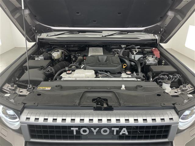 ランドクルーザー250 VX 純正12.3型ナビ JBLサウンド ムーンルーフ 丸目LEDヘッドライト 全方位カメラ ワイヤレス充電 デジタルインナーミラー BSM ルーフレール 電動リアゲート 黒革シート シートヒーター 禁煙車(24枚目)