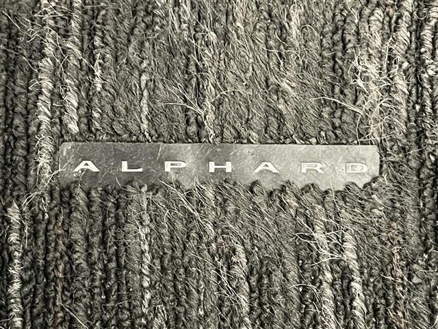 アルファードハイブリッド Z 純正14型ナビ 独立ムーンルーフ トヨタチームメイト アドバンスドパーク 全方位カメラ HUD デジタルインナーミラー AC100V 黒革 シートヒーター 両側パワスラ BSM スペアタイヤ 禁煙車(27枚目)