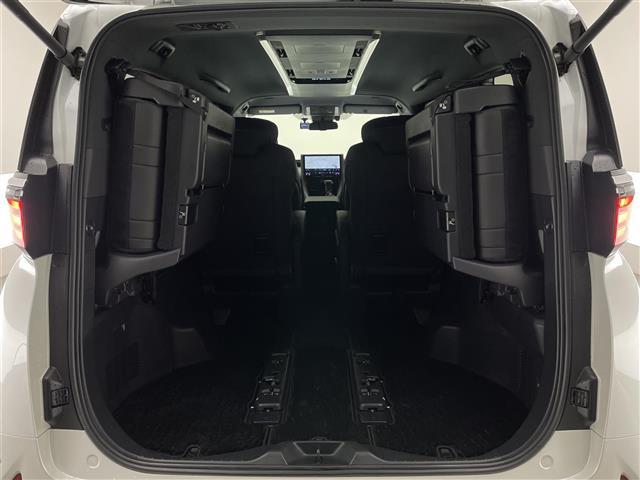 アルファードハイブリッド Z 純正14型ナビ 全方位カメラ 禁煙車 AC100V 黒革 シートヒーター エアシート 両側パワスラ BSM スペアタイヤ ワイヤレス充電 ETC2.0 前後ドラレコ オットマン 電動リアゲート LED(23枚目)