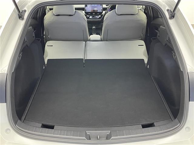 カローラツーリング ハイブリッド ダブルバイビー 純正9型DAナビフルセグTV シートヒーター DVDデッキ 革調シートカバー モデリスタガーニッシュ 電動パーキング HUD 前後ドラレコ セーフティセンス 衝突軽減 追従クルコン LEDライト 禁煙(22枚目)