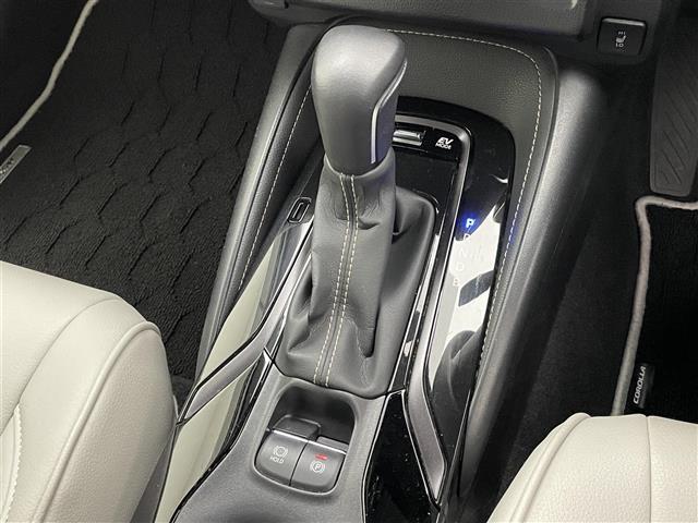 カローラツーリング ハイブリッド ダブルバイビー 純正9型DAナビフルセグTV シートヒーター DVDデッキ 革調シートカバー モデリスタガーニッシュ 電動パーキング HUD 前後ドラレコ セーフティセンス 衝突軽減 追従クルコン LEDライト 禁煙(30枚目)