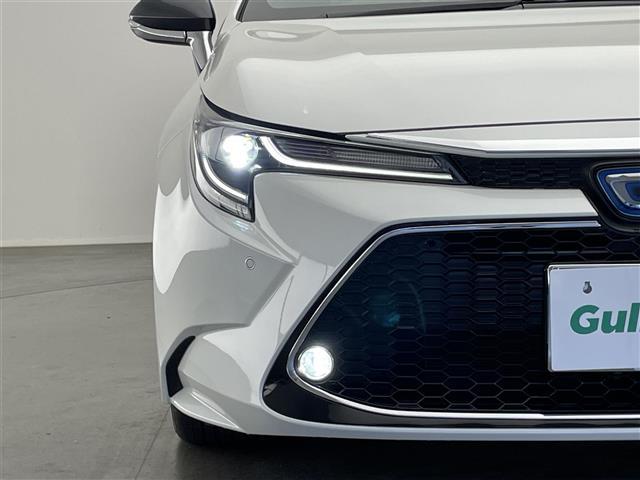 カローラツーリング ハイブリッド ダブルバイビー 純正9型DAナビフルセグTV シートヒーター DVDデッキ 革調シートカバー モデリスタガーニッシュ 電動パーキング HUD 前後ドラレコ セーフティセンス 衝突軽減 追従クルコン LEDライト 禁煙(36枚目)