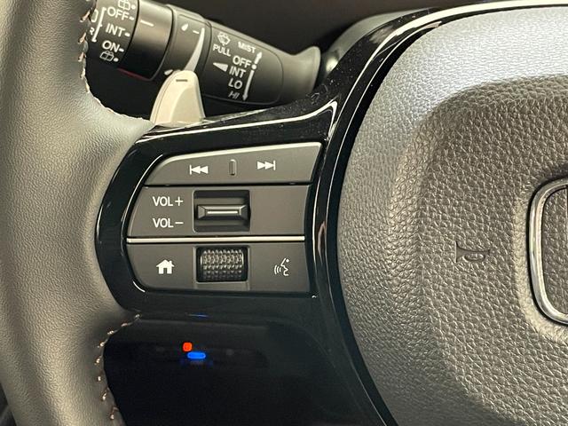 N-BOXカスタム ターボ 届出済未使用車 社外8型ナビ 禁煙車 バックカメラ シートヒーター ハーフレザー 両側パワスラ ETC パドルシフト ホンダセンシング 衝突軽減装置 追従クルコン コーナーセンサー リアロールシェード(8枚目)