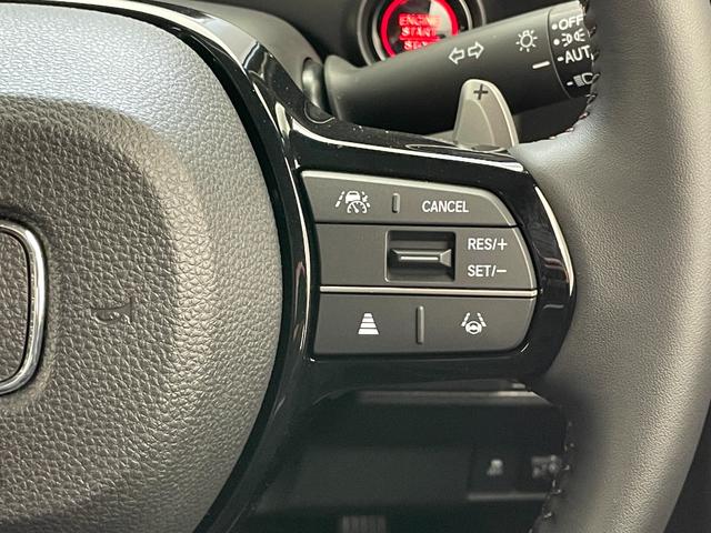 N-BOXカスタム ターボ 届出済未使用車 社外8型ナビ 禁煙車 バックカメラ シートヒーター ハーフレザー 両側パワスラ ETC パドルシフト ホンダセンシング 衝突軽減装置 追従クルコン コーナーセンサー リアロールシェード(9枚目)