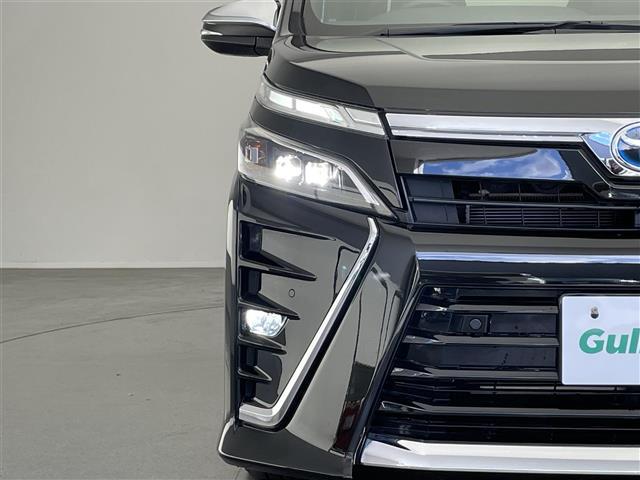 ヴォクシー ハイブリッドＺＳ　煌ＩＩＩ　純正１０型ナビ　純正１２型後席モニター　シートヒーター　バックカメラ　両側パワスラ　ハーフレザー　コーナーセンサー　ＥＴＣ　セーフティセンス　衝突軽減　前後ドラレコ　ＬＥＤオートライト　フォグ　禁煙車（34枚目）