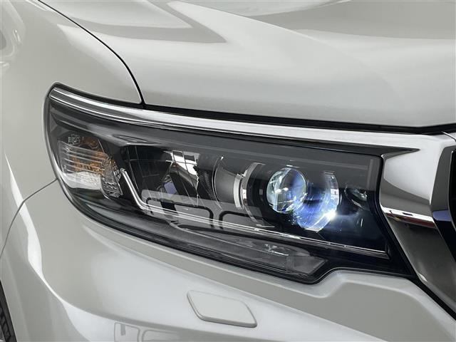 ランドクルーザープラド TX Lパッケージ メーカーナビ ムーンルーフ ベージュ革シート 全方位カメラ シートヒーター 前後ドラレコ BSM ETC2.0 セーフティセンス 衝突軽減 追従クルコン コーナーセンサー LEDオートライト フォグ(35枚目)