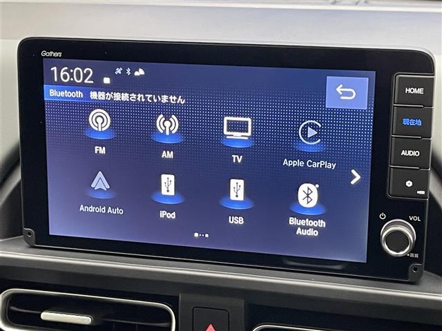 フリード ｅ：ＨＥＶクロスター　登録済未使用車　純正９型ナビ　フルセグＴＶ　Ｂｌｕｅｔｏｏｔｈ　ＵＳＢ　ＢＳＭ　シートヒーター　ハーフレザー　両側パワースライドドア　ホンダセンシング　衝突軽減　追従クルコン　ＬＥＤオートライト　禁煙（10枚目）