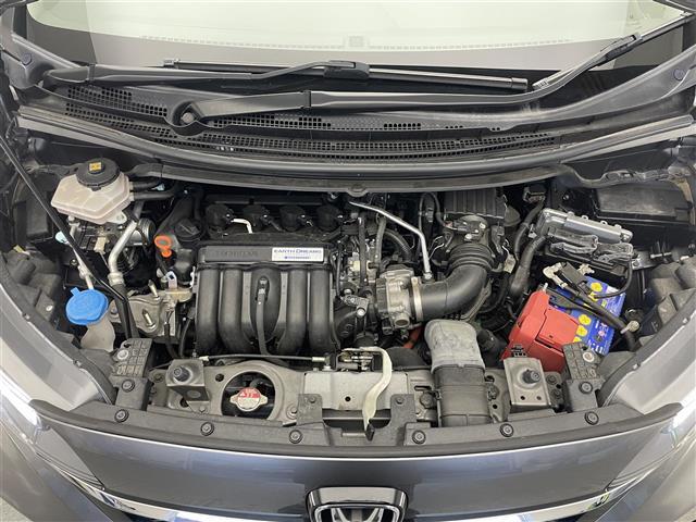 フリードハイブリッド ハイブリッド・Ｇホンダセンシング　社外８型ナビ　社外１１．６型後席モニター　禁煙車　バックカメラ　フルセグＴＶ　ＨＤＭＩ　両側パワスラ　ＥＴＣ　シートヒーター　ハーフレザー　ホンダセンシング　衝突軽減装置　追従クルコン　ハンドル支援（24枚目）