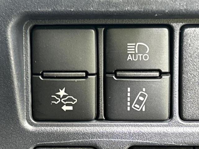 ヴォクシー ハイブリッドＺＳキラメキ２　新品タイヤ／保証書／社外　１０インチ　ＳＤナビ／フリップダウンモニター　社外　１２．８インチ／衝突安全装置／両側電動スライドドア／車線逸脱防止支援システム　衝突被害軽減システム　バックカメラ　禁煙車（30枚目）