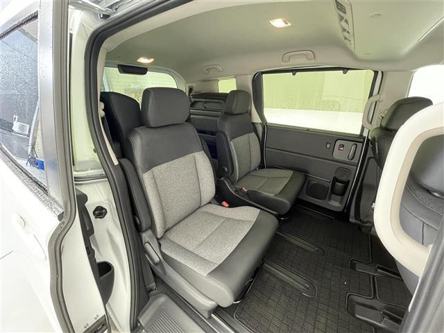 フリード ｅ：ＨＥＶエアー　ＥＸ　禁煙車／純正９型ナビ／両側パワースライドドア／全方位カメラ／追従クルーズコントロール／レーンキープアシスト／ハーフレザーシート／シートヒーター／ブラインドスポットインフォメーション／クリアランスソナー（23枚目）