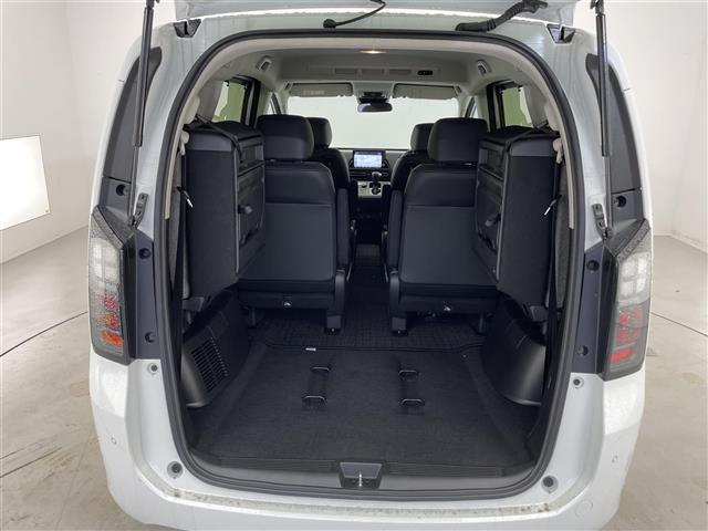 フリード ｅ：ＨＥＶエアー　ＥＸ　禁煙車／純正９型ナビ／両側パワースライドドア／全方位カメラ／追従クルーズコントロール／レーンキープアシスト／ハーフレザーシート／シートヒーター／ブラインドスポットインフォメーション／クリアランスソナー（26枚目）