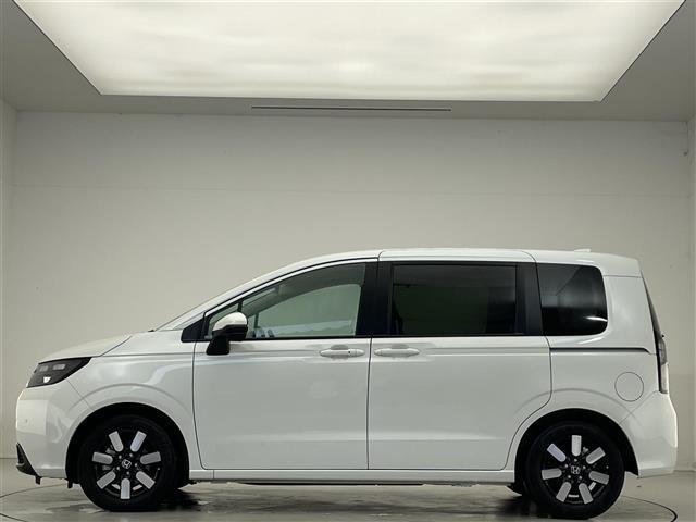 フリード ｅ：ＨＥＶエアー　ＥＸ　禁煙車／純正９型ナビ／両側パワースライドドア／全方位カメラ／追従クルーズコントロール／レーンキープアシスト／ハーフレザーシート／シートヒーター／ブラインドスポットインフォメーション／クリアランスソナー（32枚目）