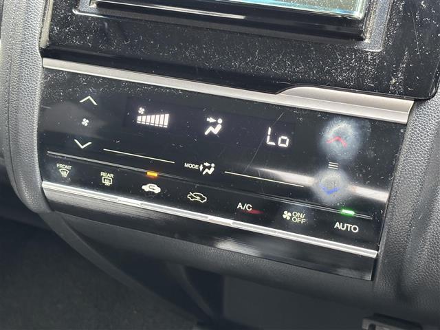 フィット １５Ｘ　禁煙車／社外７型ポータブルナビ／ＥＴＣ／プッシュスタート／スマートキー／ステアリングリモコン／ドアバイザー（15枚目）