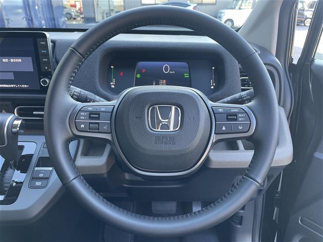 フリード e:HEVエアー EX 登録済未使用車/純正9インチナビ/ホンダセンシング/バックカメラ/クルーズコントロール/ハーフレザーシート/シートヒーター/電子パーキング ブラインドスポットモニター/純正アルミホイール(8枚目)