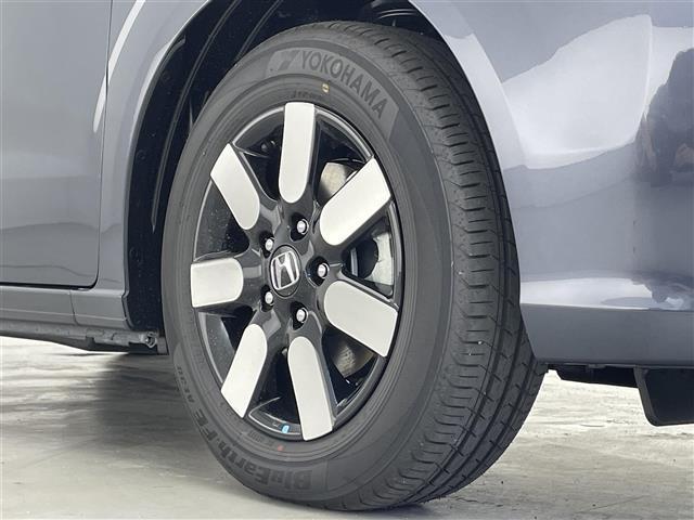 フリード e:HEVエアー EX 登録済未使用車/純正9インチナビ/ホンダセンシング/バックカメラ/クルーズコントロール/ハーフレザーシート/シートヒーター/電子パーキング ブラインドスポットモニター/純正アルミホイール(26枚目)