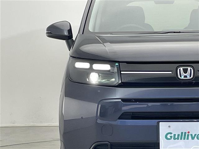 フリード e:HEVエアー EX 登録済未使用車/純正9インチナビ/ホンダセンシング/バックカメラ/クルーズコントロール/ハーフレザーシート/シートヒーター/電子パーキング ブラインドスポットモニター/純正アルミホイール(27枚目)