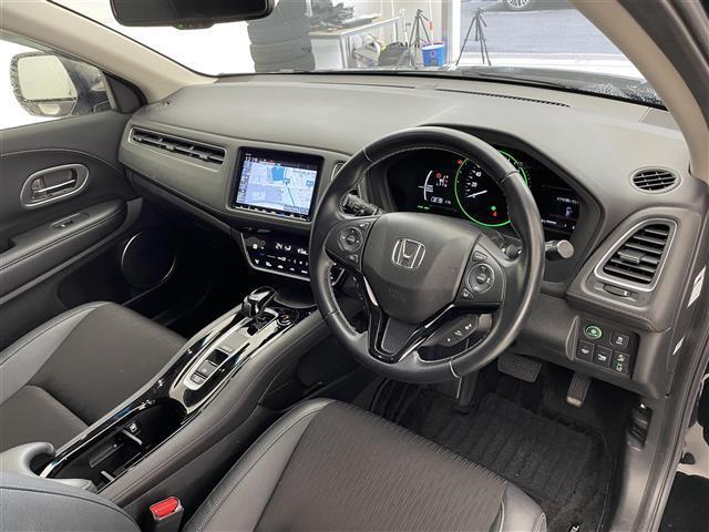 ヴェゼル ハイブリッドＺ・ホンダセンシング　禁煙車／純正８型インチナビ／シートヒーター／バックカメラ／ドライブレコーダー／ホンダセンシング／追従クルーズコントロール／電動パーキングブレーキ／ハーフレザーシート／ＬＥＤライト／衝突軽減ブレーキ（21枚目）