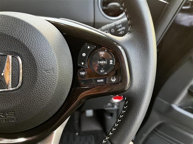 N-BOXカスタム G・EXターボホンダセンシング 禁煙車/純正9インチナビ/ホンダセンシング/バックカメラ/追従クルーズコントロール/両側パワースライドドア/アイドリングストップ/シートヒーター/ハーフレザー/MTモード付AT/LEDヘッドライト(11枚目)