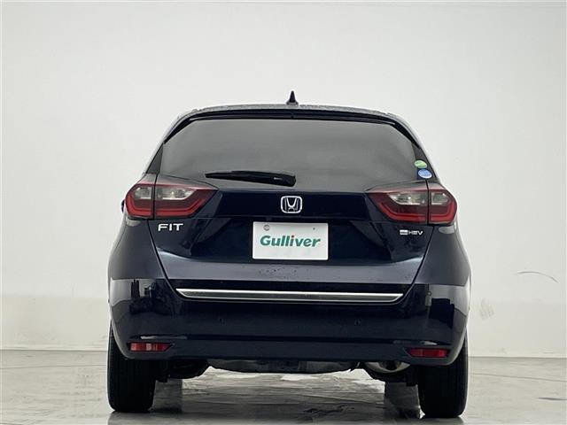 フィット ｅ：ＨＥＶリュクス　禁煙車／９インチナビ／フルセグＴＶ／ワイヤレス充電／センターコンソール／ＥＴＣ／ドラレコ／シートヒーター／ステアリングヒーター／ハーフレザーシート／追従クルーズコントロール／ホンダセンシング（30枚目）
