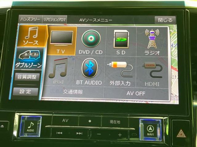アルファード Ｓ　保証書／社外　１１インチ　ＳＤナビ／フリップダウンモニター　社外　１２．８インチ／両側電動スライドドア／ヘッドランプ　ＬＥＤ／Ｂｌｕｅｔｏｏｔｈ接続／ＥＴＣ／ＥＢＤ付ＡＢＳ／横滑り防止装置　ＤＶＤ再生（11枚目）