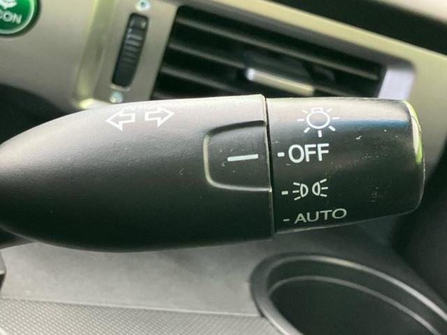 フリード Gプレミアムエディション 純正 SDナビ/フリップダウンモニター 純正 9インチ/両側電動スライドドア/シート ハーフレザー/ヘッドランプ HID/Bluetooth接続/ETC/EBD付ABS/横滑り防止装置 バックカメラ(16枚目)