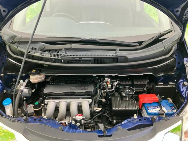 フリード Gプレミアムエディション 純正 SDナビ/フリップダウンモニター 純正 9インチ/両側電動スライドドア/シート ハーフレザー/ヘッドランプ HID/Bluetooth接続/ETC/EBD付ABS/横滑り防止装置 バックカメラ(57枚目)