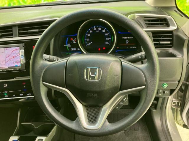 フィットハイブリッド ハイブリッド・Ｆパッケージ　新品タイヤ／保証書／純正　ＳＤナビ／Ｂｌｕｅｔｏｏｔｈ接続／ＥＴＣ／ＥＢＤ付ＡＢＳ／横滑り防止装置／アイドリングストップ／ワンセグＴＶ／ＤＶＤ／エアバッグ　運転席／エアバッグ　助手席／衝突安全ボディ（14枚目）