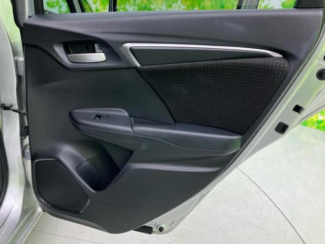 フィットハイブリッド ハイブリッド・Ｆパッケージ　新品タイヤ／保証書／純正　ＳＤナビ／Ｂｌｕｅｔｏｏｔｈ接続／ＥＴＣ／ＥＢＤ付ＡＢＳ／横滑り防止装置／アイドリングストップ／ワンセグＴＶ／ＤＶＤ／エアバッグ　運転席／エアバッグ　助手席／衝突安全ボディ（21枚目）