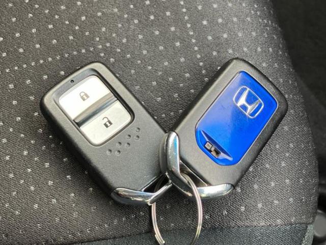 フィットハイブリッド ハイブリッド・Ｆパッケージ　新品タイヤ／保証書／純正　ＳＤナビ／Ｂｌｕｅｔｏｏｔｈ接続／ＥＴＣ／ＥＢＤ付ＡＢＳ／横滑り防止装置／アイドリングストップ／ワンセグＴＶ／ＤＶＤ／エアバッグ　運転席／エアバッグ　助手席／衝突安全ボディ（50枚目）