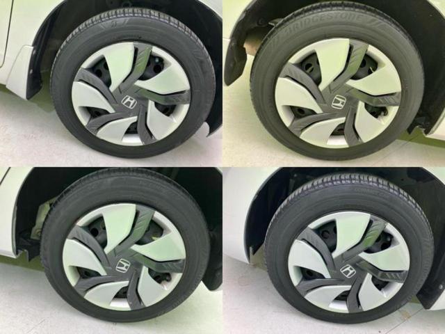 フィットハイブリッド ハイブリッド・Ｆパッケージ　新品タイヤ／保証書／純正　ＳＤナビ／Ｂｌｕｅｔｏｏｔｈ接続／ＥＴＣ／ＥＢＤ付ＡＢＳ／横滑り防止装置／アイドリングストップ／ワンセグＴＶ／ＤＶＤ／エアバッグ　運転席／エアバッグ　助手席／衝突安全ボディ（60枚目）