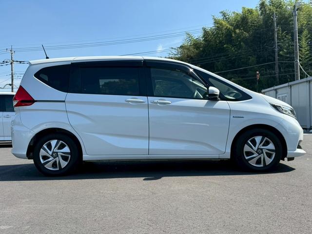 フリードハイブリッド ハイブリッド・Ｇホンダセンシング　純正ナビ　フルセグ　バックモニター　両側パワースライドドア　ＬＥＤヘッドライト　衝突軽減ブレーキ　レーダークルーズコントロール　車線逸脱　誤発信抑制　標識認識　スマートキー（8枚目）