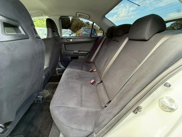 ランサー ＧＳＲエボリューションＸ　５速ＭＴ　ナビ　バックモニター　ＥＴＣ　Ｂｌｕｅｔｏｏｔｈ　フルセグＴＶ　リアウイング　車検Ｒ８年１１月　ＭＯＭＯステアリング　社外１８インチアルミ　社外マフラー（13枚目）